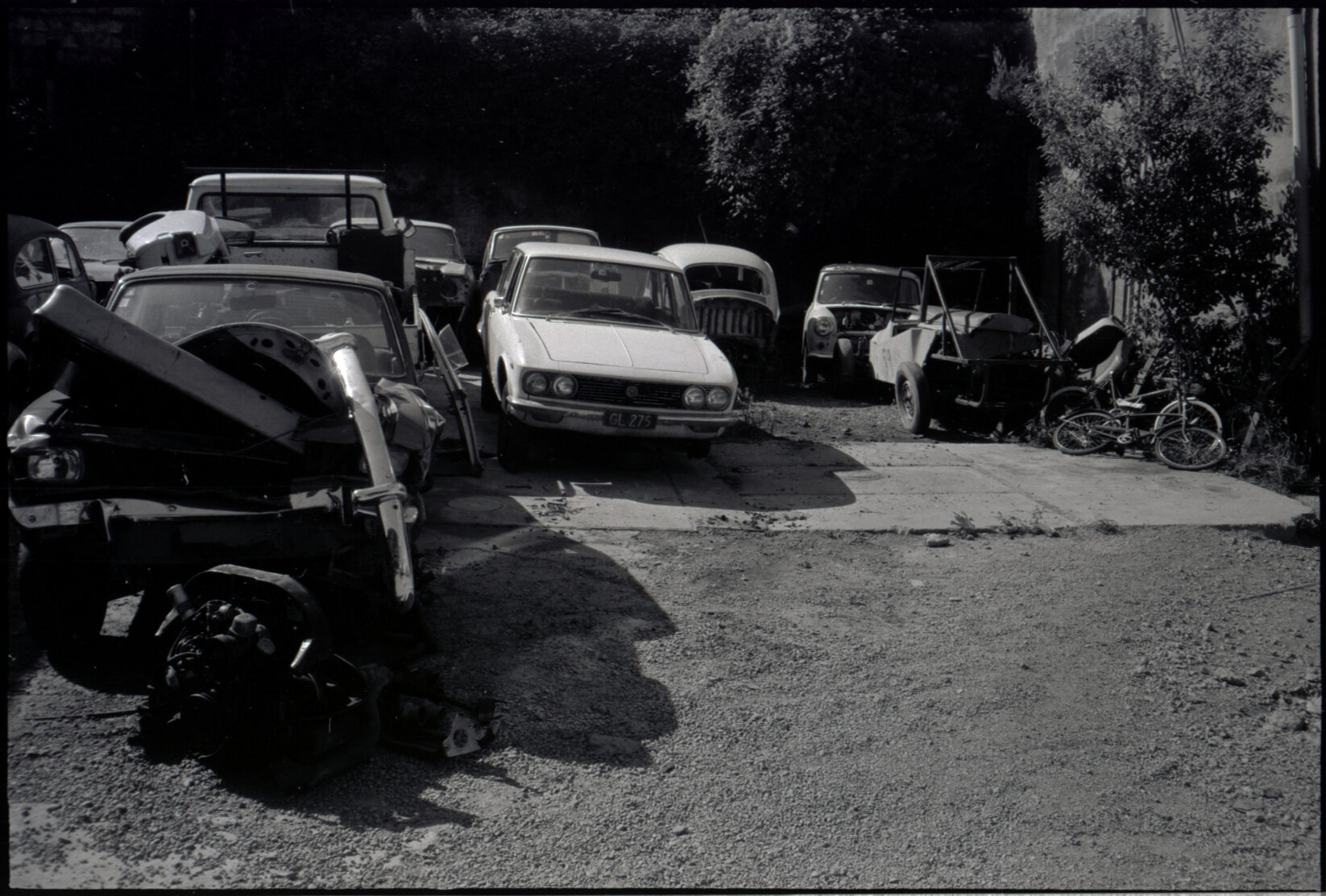 Derelict vehicles and parked cars
