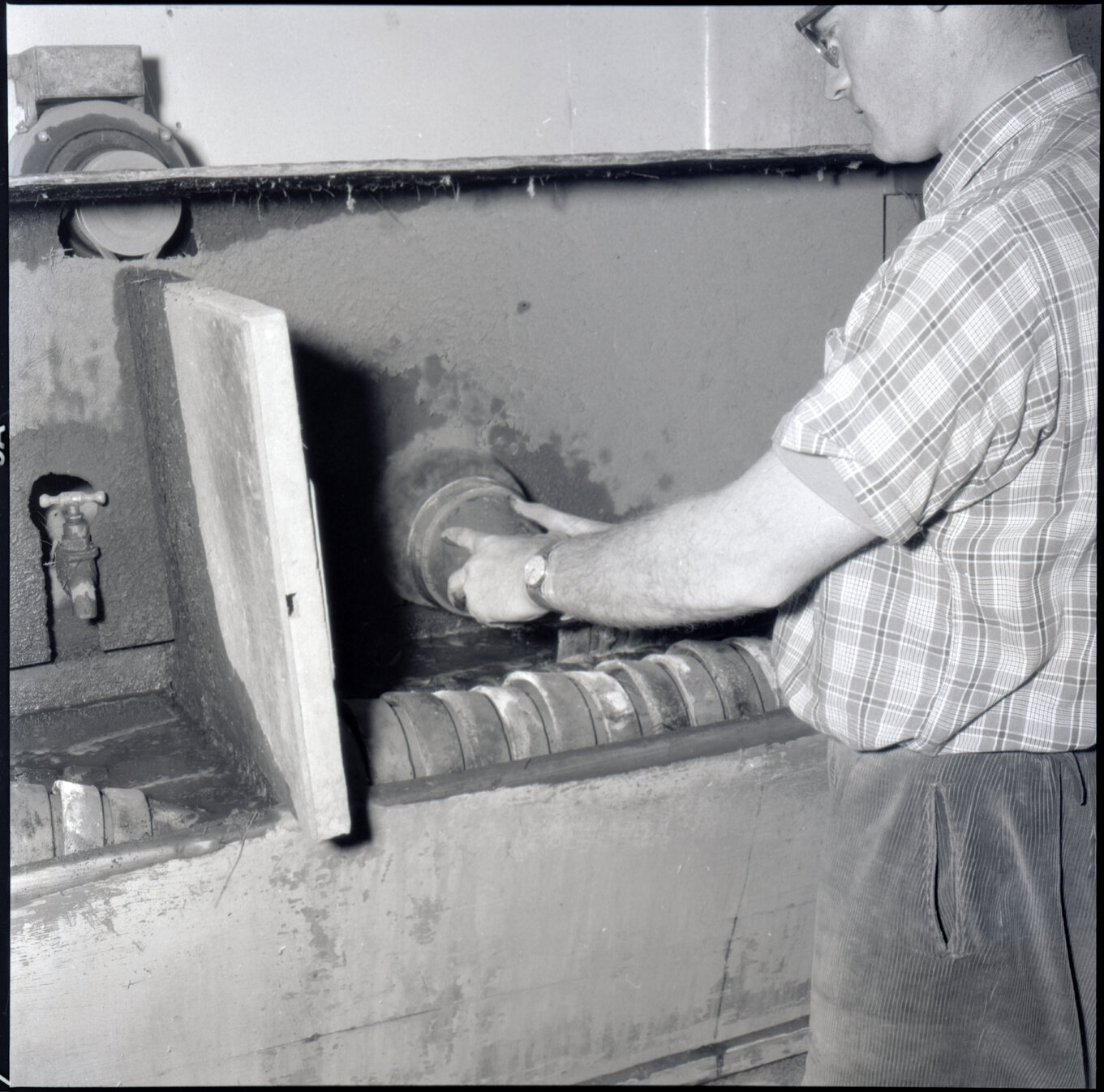 a. Berhampore Nursery, potting shed, staff potting seedlings