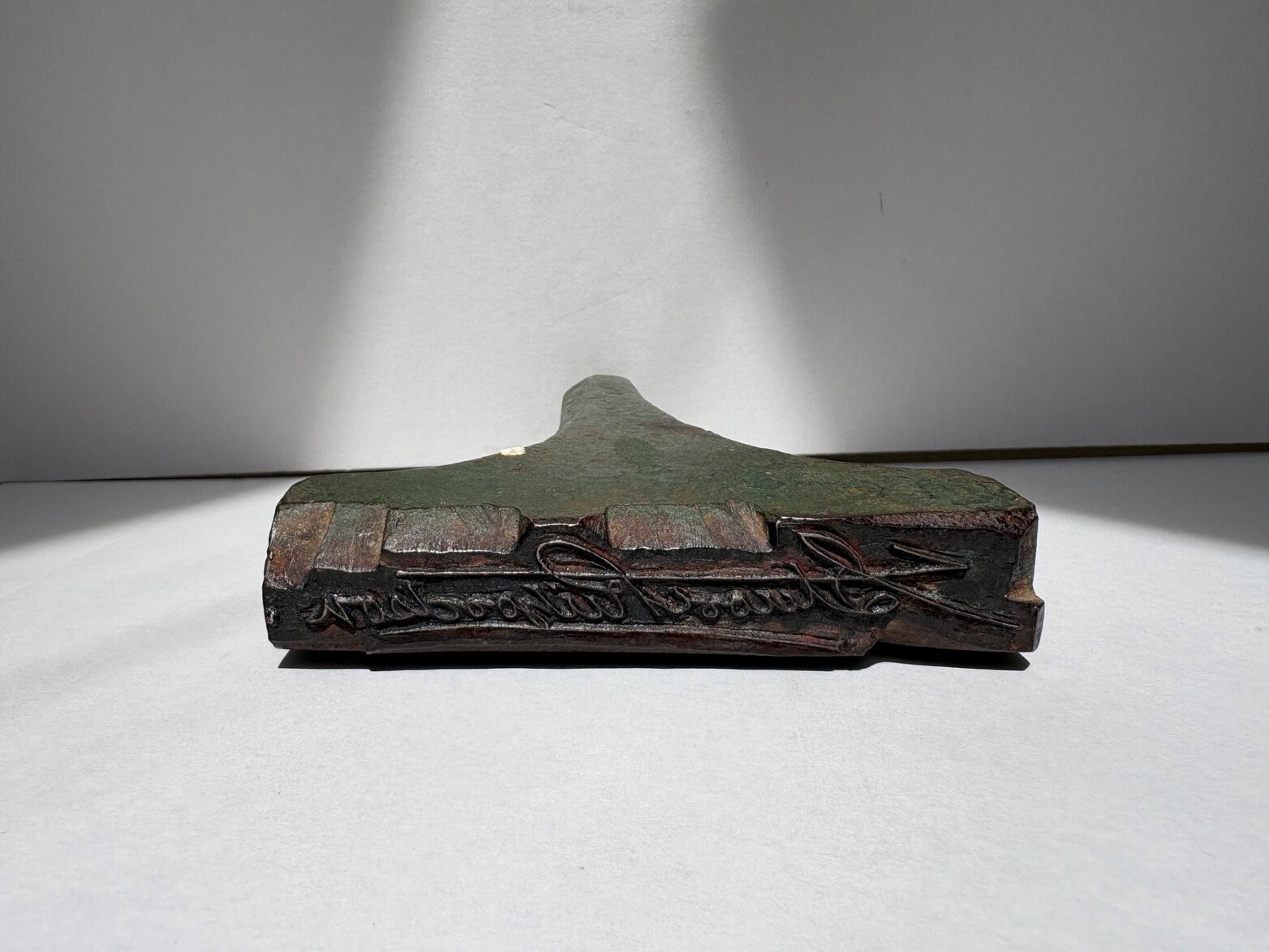 Metal stamp signature of Stuart Richardson