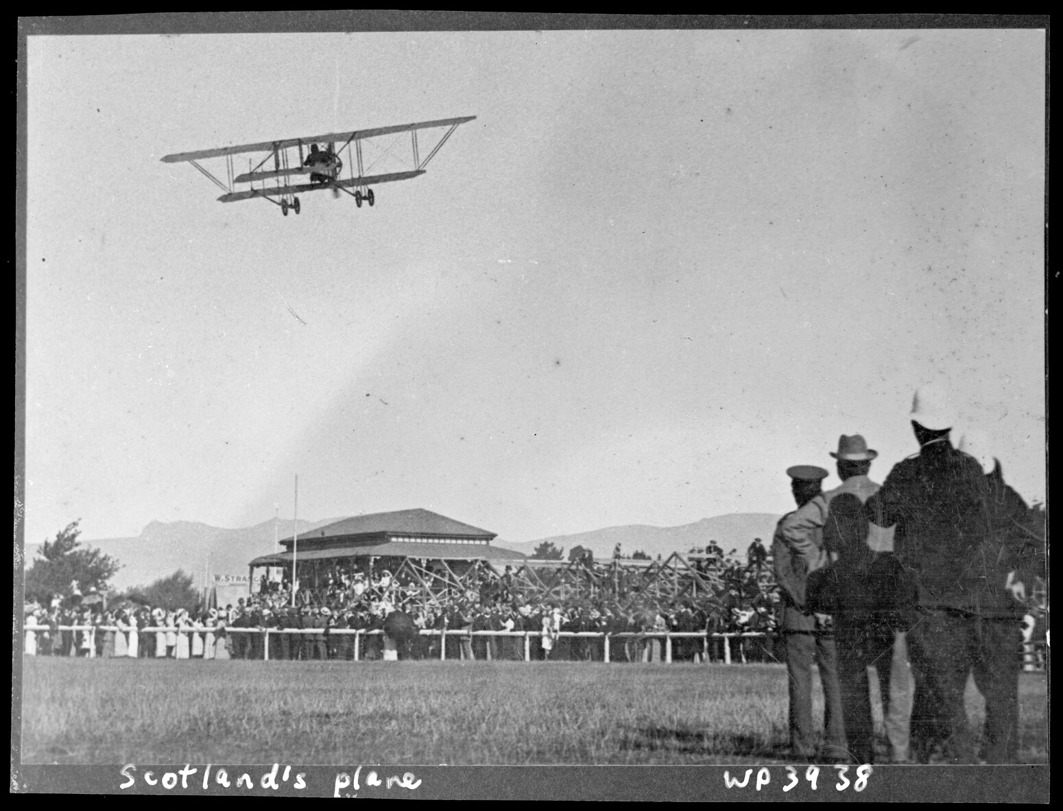 J W H Scotland's Caudron Biplane, circling Wigram, Christchurch
