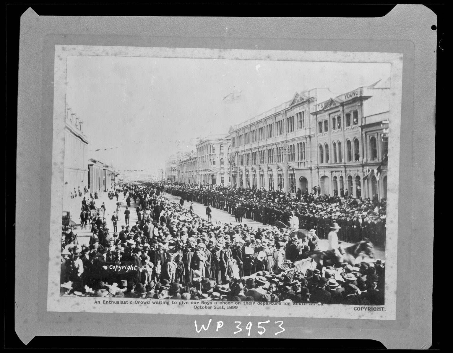 'An enthusiastic crowd waiting to give our Boys a cheer on their departure for South Africa'.