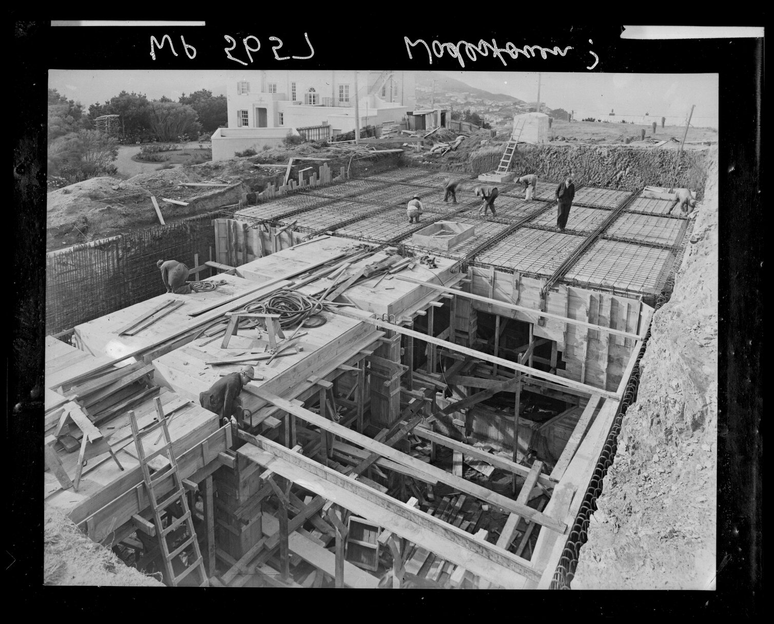 Workmen constructing unidentified structure, Wadestown Road, Wadestown