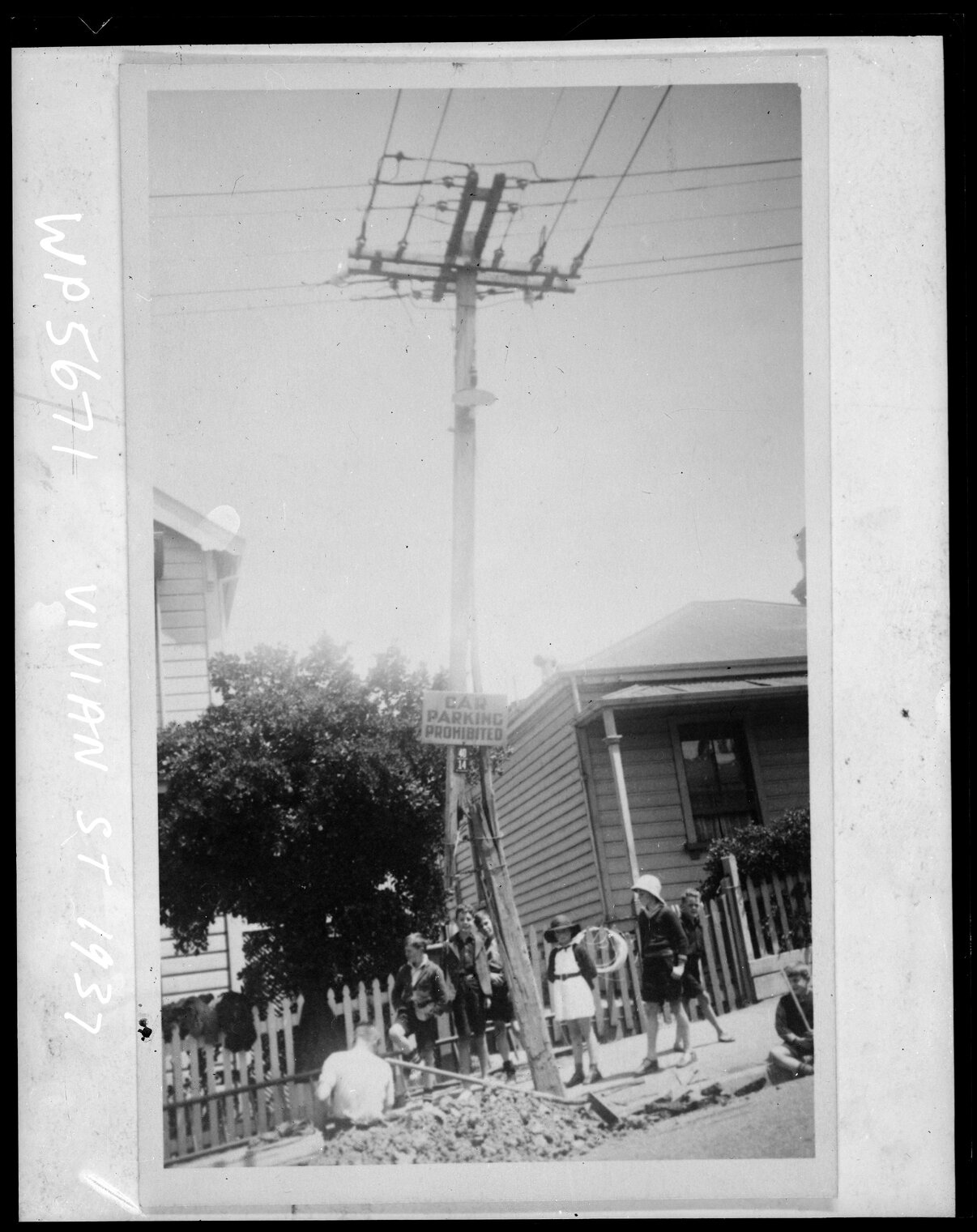 Children walking past road works, Vivian Street