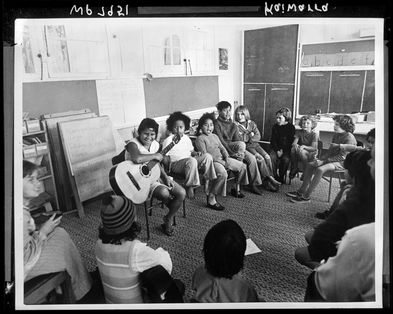 Interior of Kaiwharawhara School classroom, children