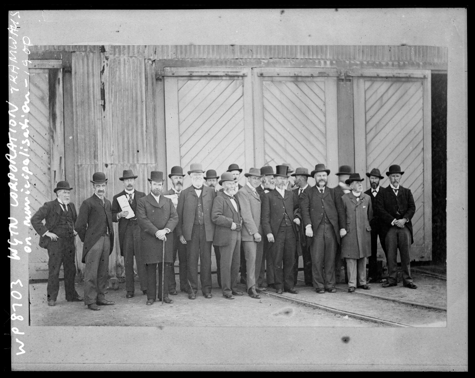 Group Photograph, outside the Adelaide Road tram barns on the occasion of the municipalisation of the tramways.
