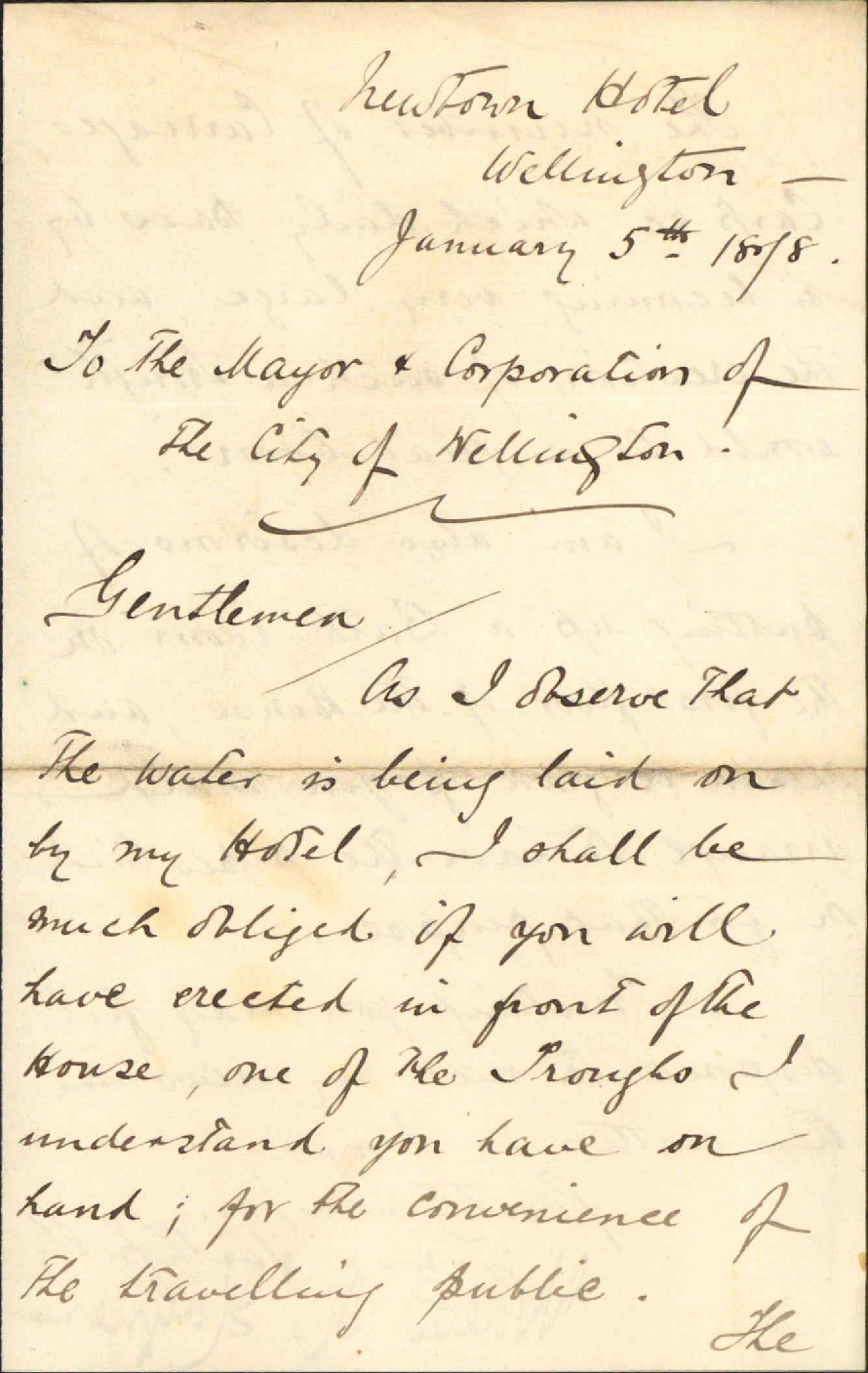 Re erection of water trough in front of hotel - Walter H Harper