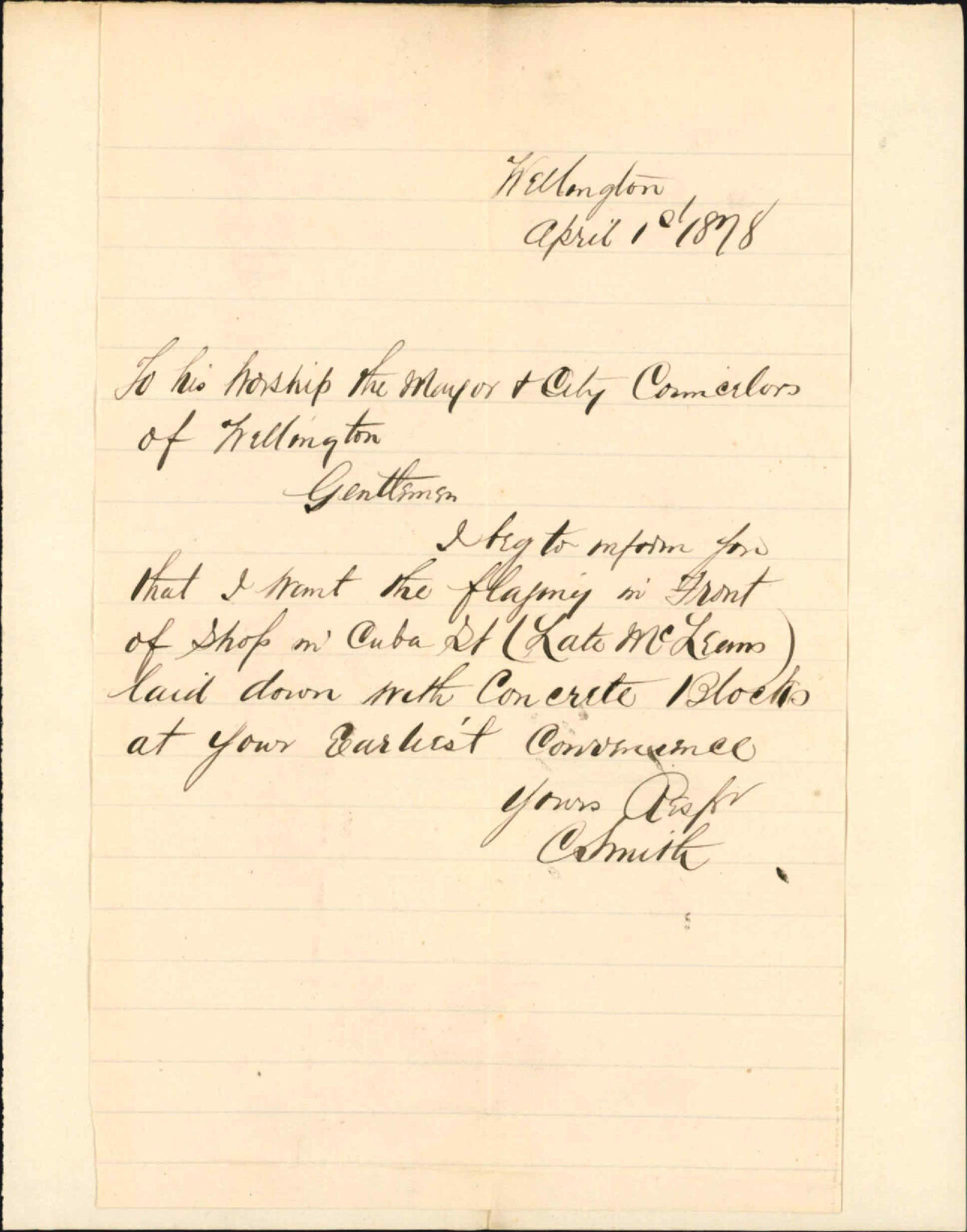 Re laying concrete blocks on footpath in front of shop in Cuba Street - C Smith