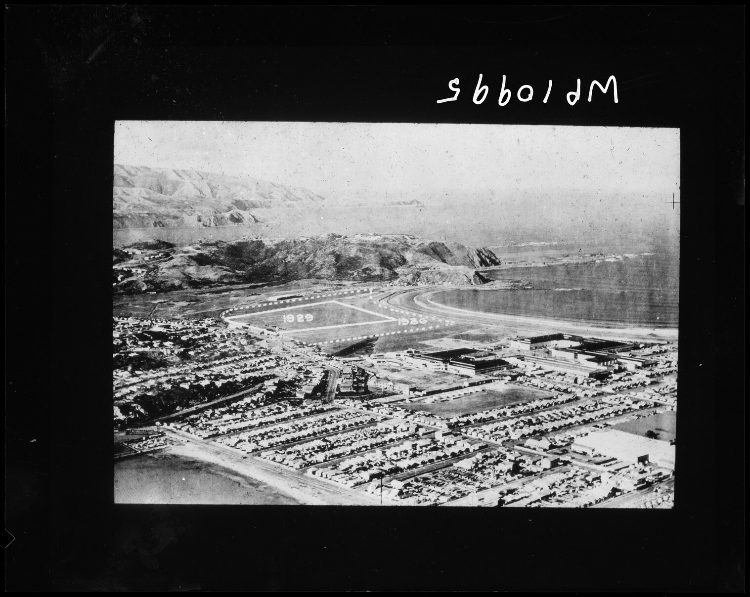 Elevated view of Centennial Exhibition buildings, Lyall Bay, and area to be developed as airport, Rongotai.