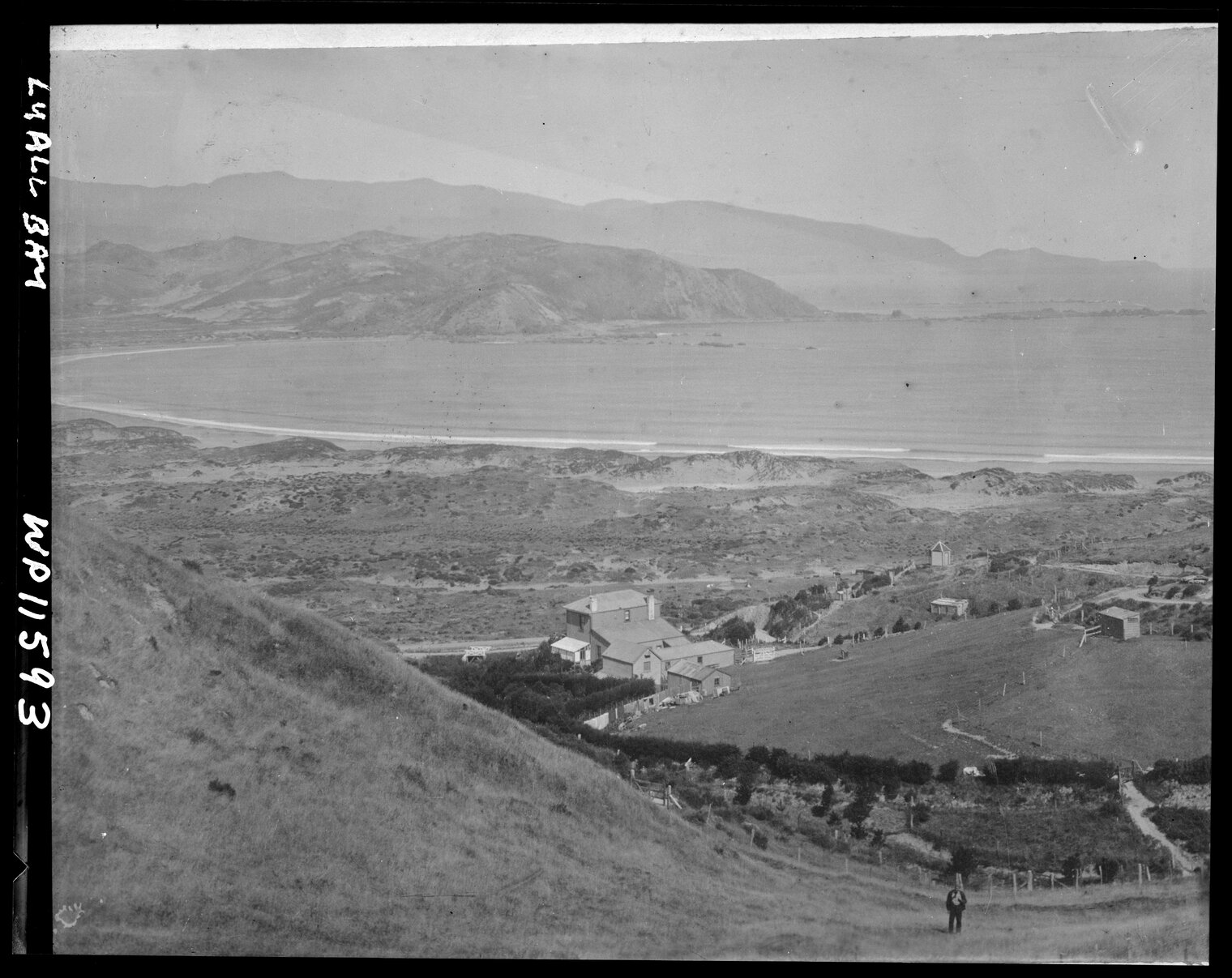 Elevated view of a wooden dwelling overlooking Lyall Bay [112 Queens Drive]