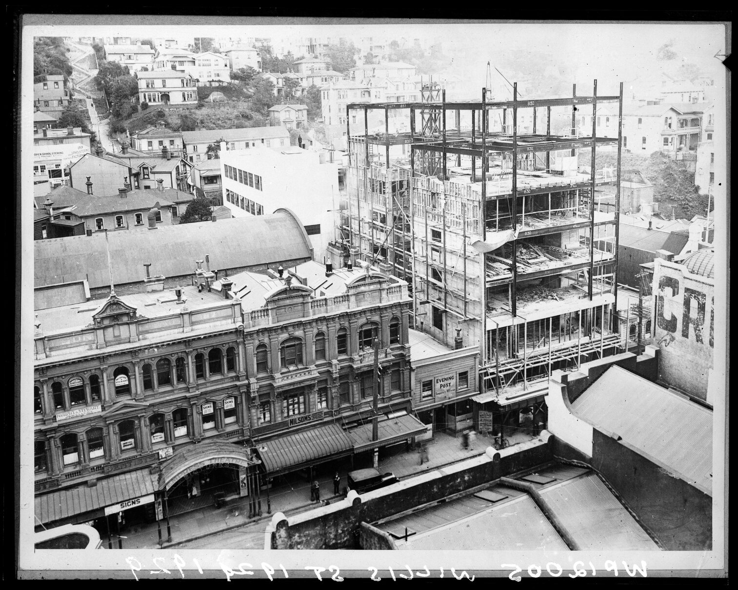 Willis Street, Evening Post building being constructed . Entrance to the Empress Theatre on the left.