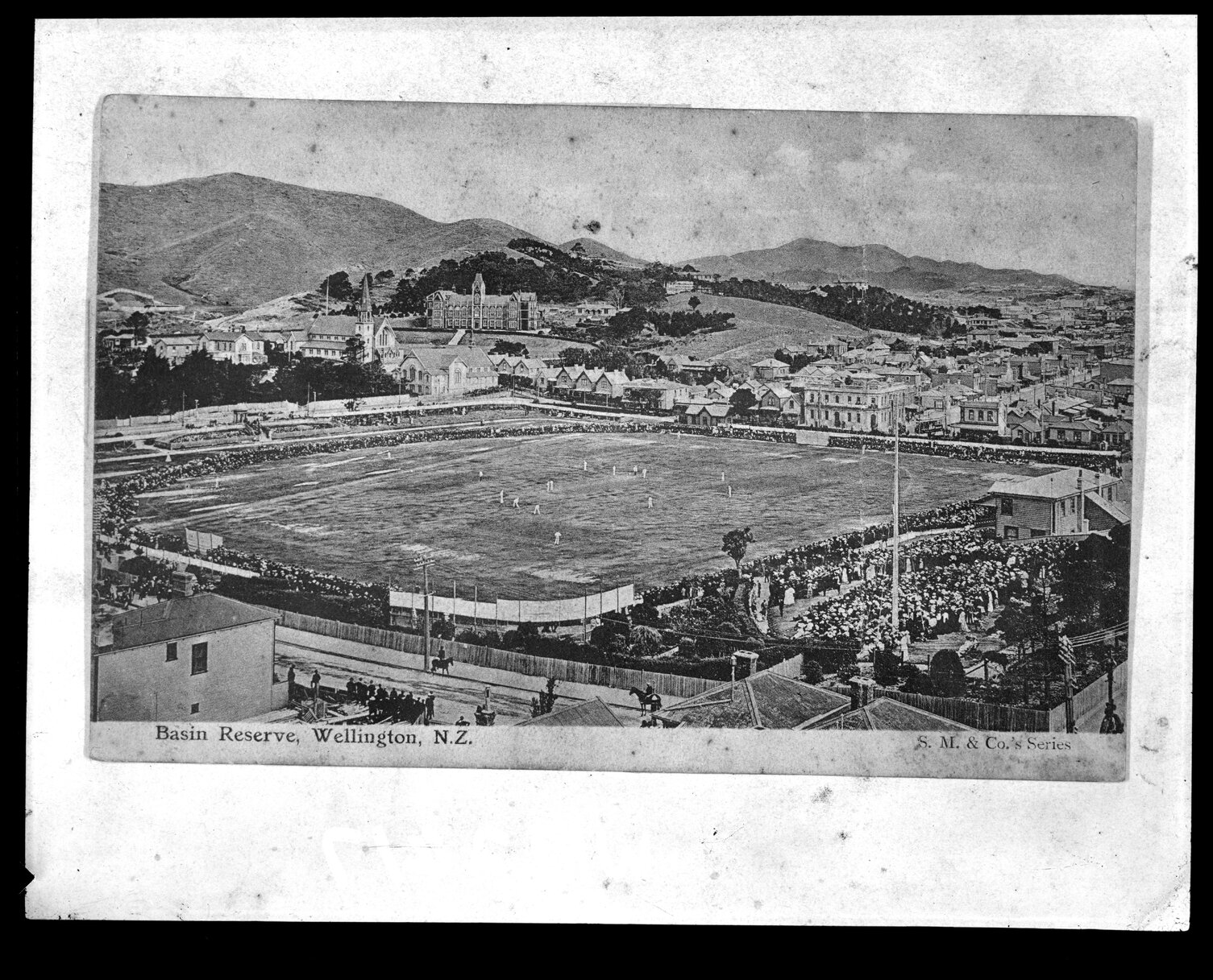 Overlooking the Basin Reserve, game of cricket in progress.