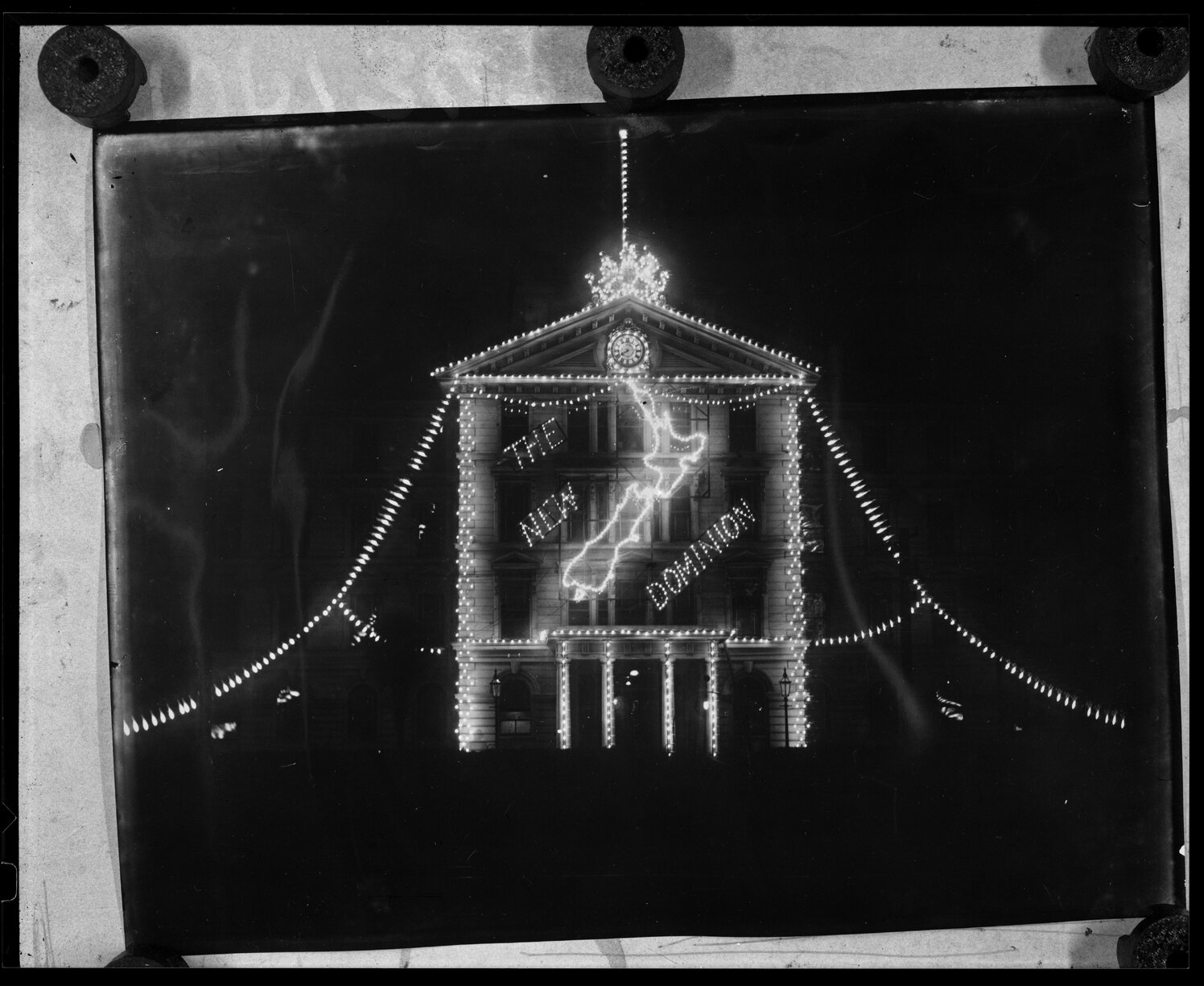 Government Buildings illuminated at night to celebrate Dominion Day