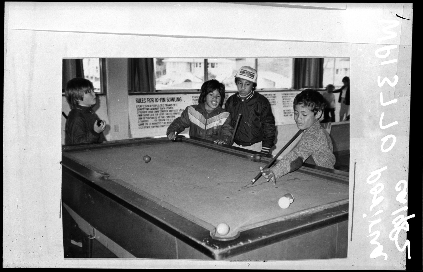 Boys playing pool, Porirua