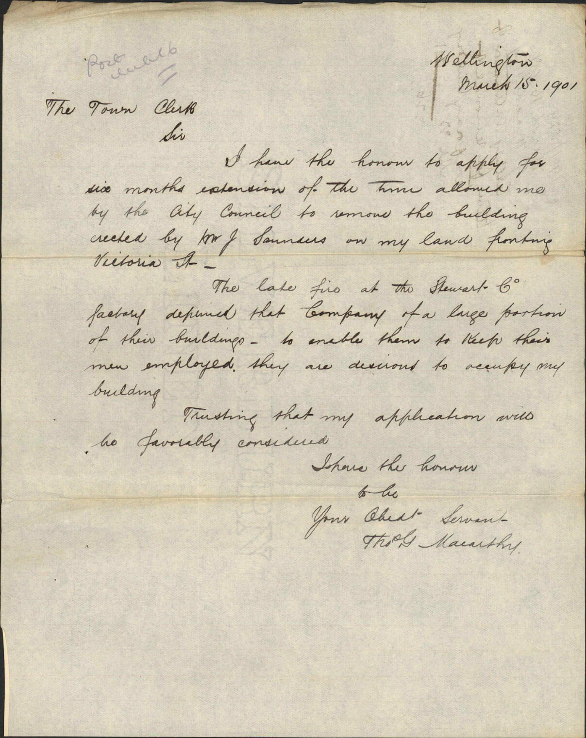 Asking extension of time for removal of temporary building - T G Macarthy