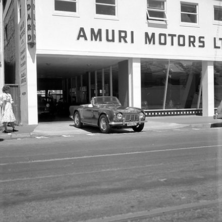 e. Traffic Department, Traffic Officer with man in sportscar.