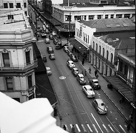 b. Elevated view of Cuba Street from James Smith Corner. Royal Oak Hotel on the left. Woolworths Building on the corner of Dixon Street. Motor vehicles