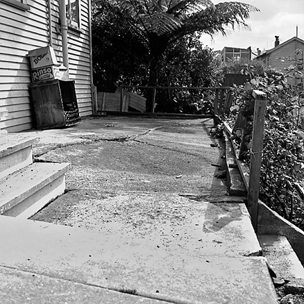 a. damage to concrete path