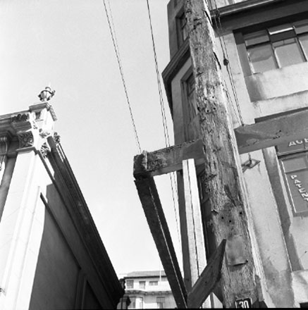 a. Views of structural supports of veranda, appear to be damaged