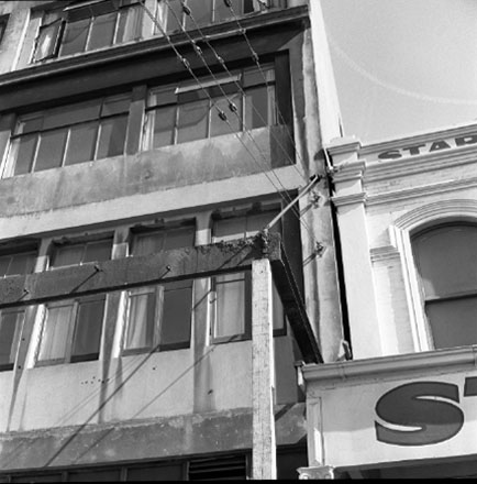 b. Views of structural supports of veranda, appear to be damaged