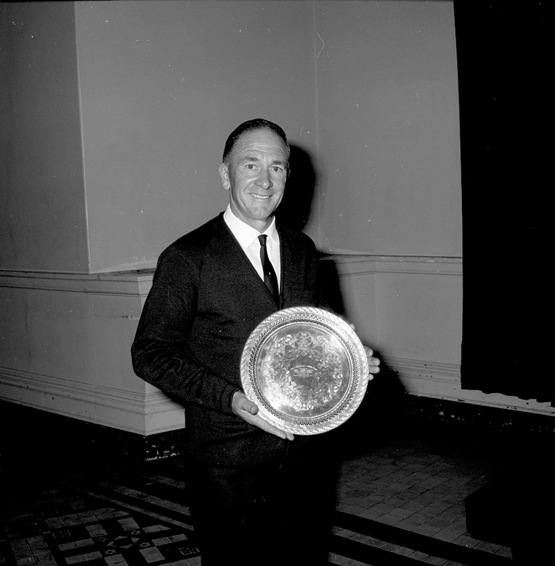 a. Kel Baker and Golf Trophy