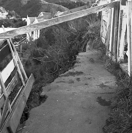 b. A slip has blocked the pedestrian access to 59 Fairlie Terrace