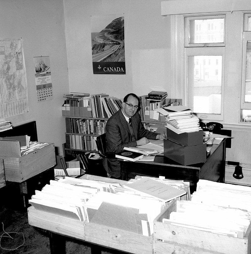 a. George Betts, author, at desk