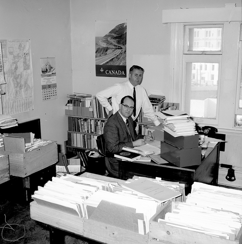 c. George Betts, author, at desk