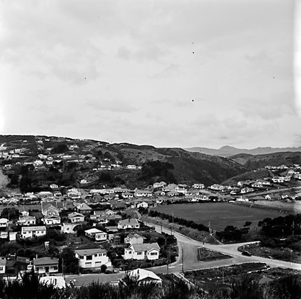 c. elevated views of residential area, Saint Bridgid's School in the background