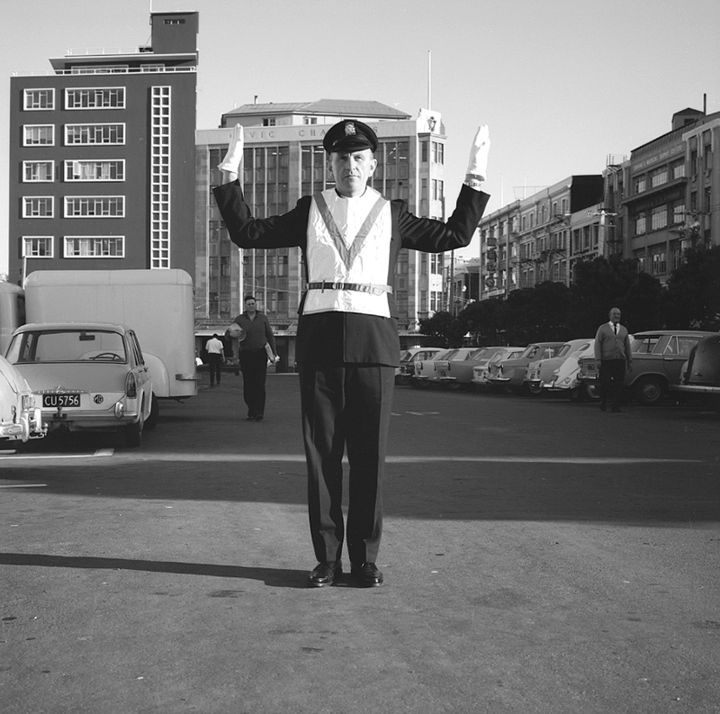b. Traffic officer demonstrating signals