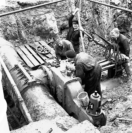 a. Workmen installing / repairing underground machinery