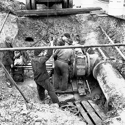 b. Workmen installing / repairing underground machinery