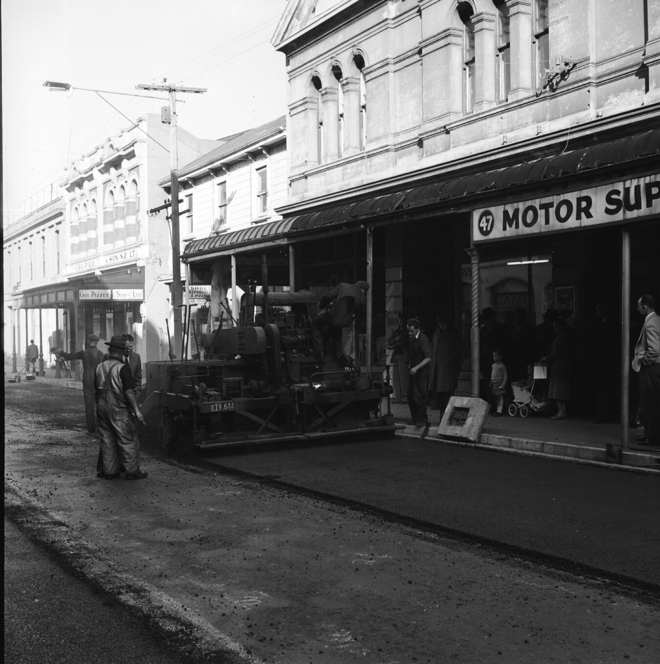 c. Looking east from Cuba Street corner to Marion Street, Union Clothing Company, 47 Ghuznne Street Motor Supplies