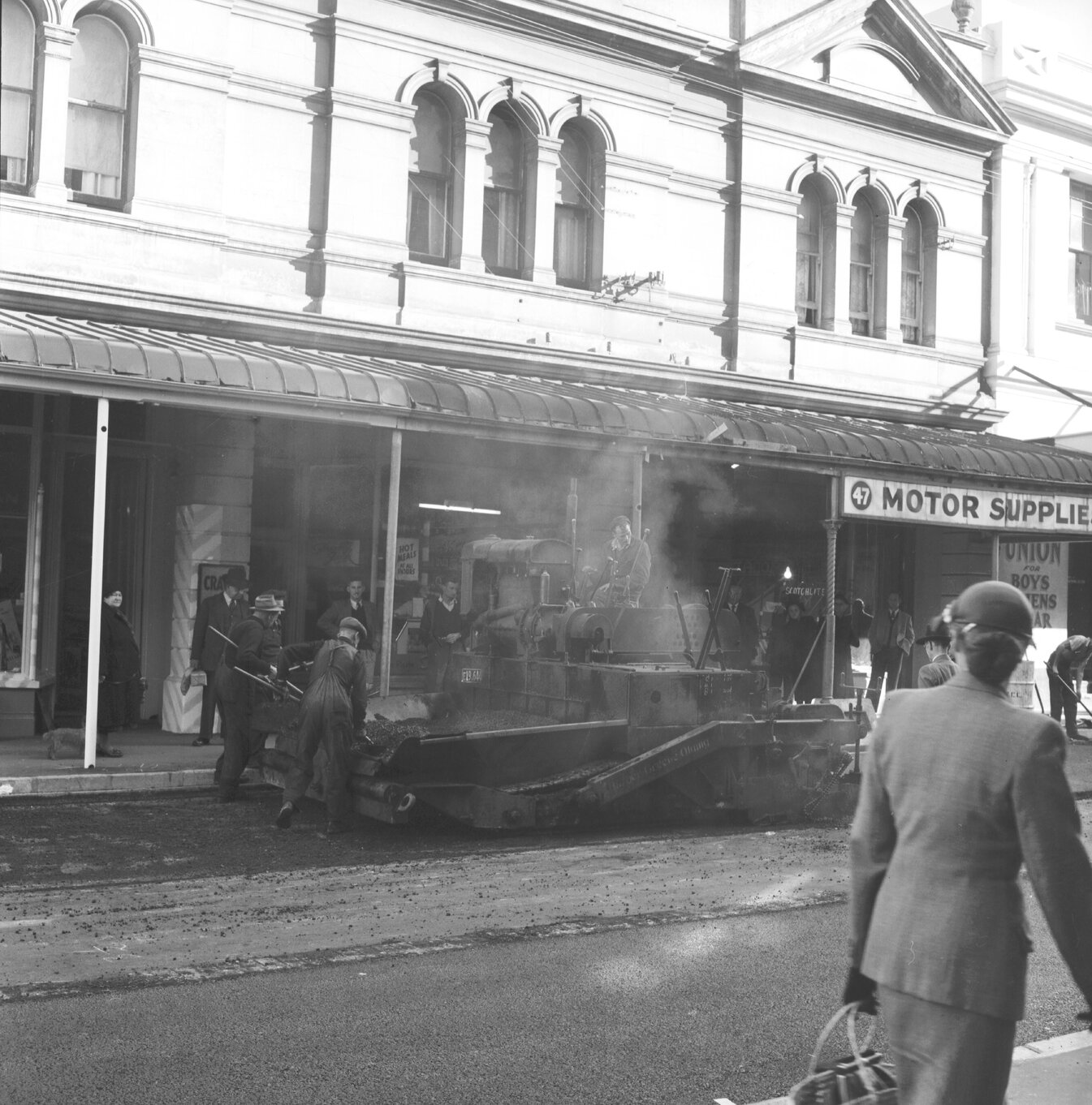 e. Looking east from Cuba Street corner to Marion Street, Union Clothing Company, 47 Ghuznne Street Motor Supplies
