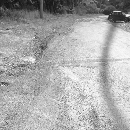 b. Opposite No 54 Helston Road