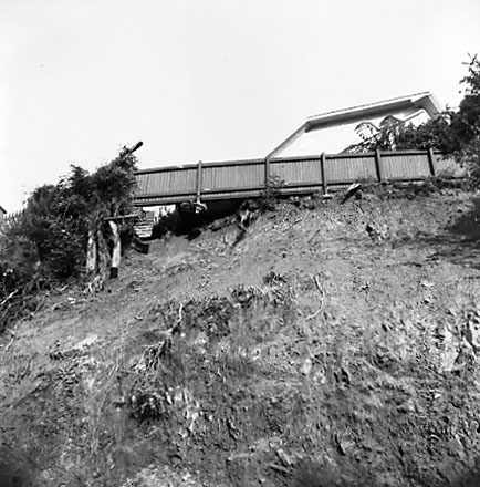 b. Residential property affected by slip