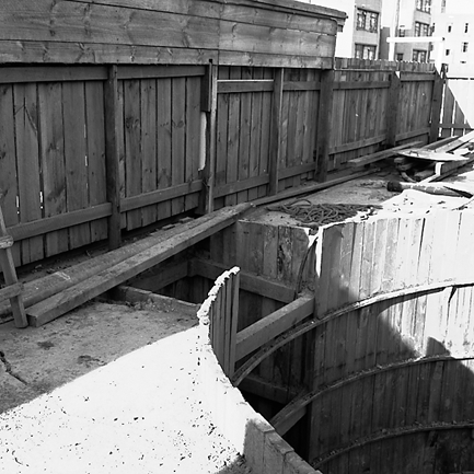 c. Workmen constructing reservoir