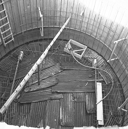 c. Interior views of. Workmen constructing underground pumping station