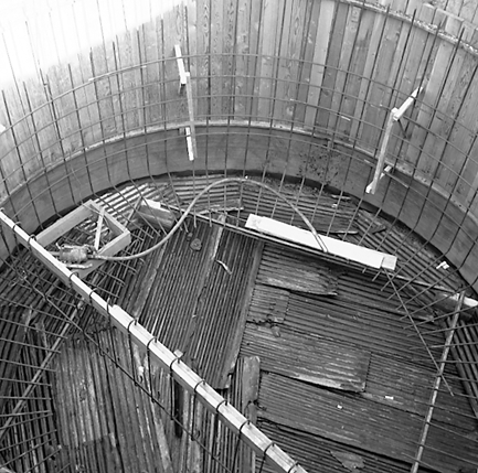 e. Interior views of. Workmen constructing underground pumping station