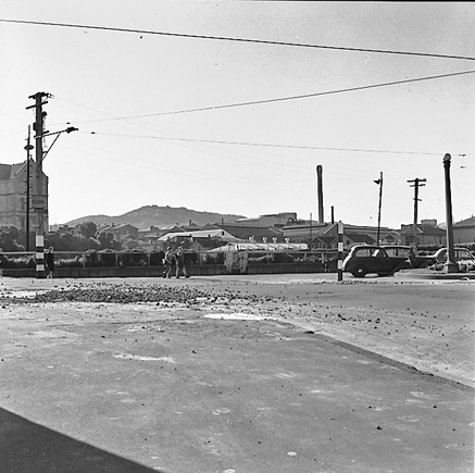 c. Saint Patricks School in background, people crossing road on pedestrian crossing