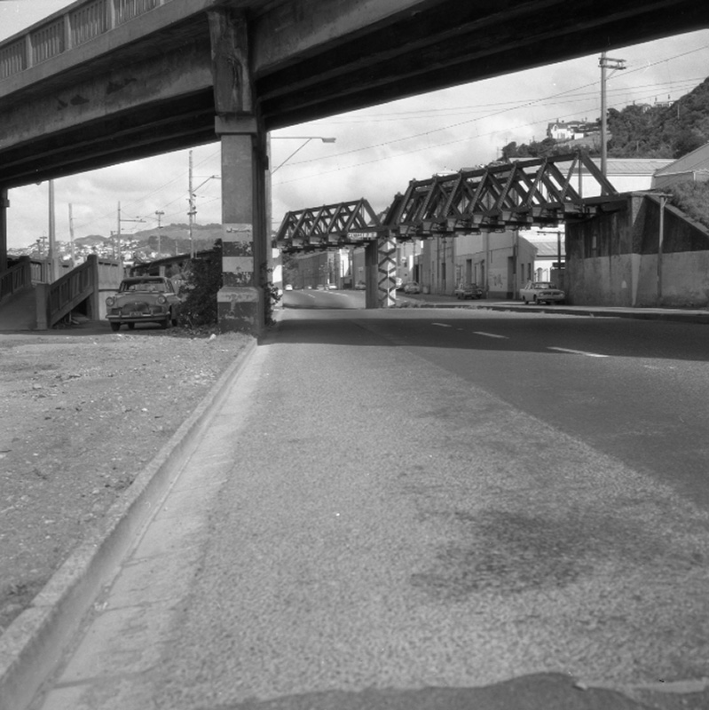 e. Elevated view of Hutt Road looking south, Post Office and BP Service Station on the corner. Commercial-industrial area