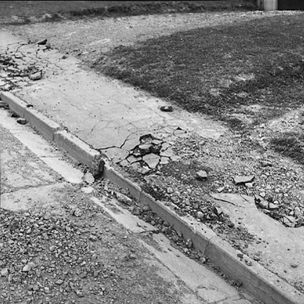 a. Albert Street, damage to kerb and channelling