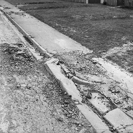 b. Albert Street, damage to kerb and channelling