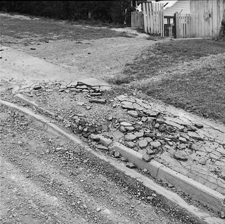 c. Albert Street, damage to kerb and channelling