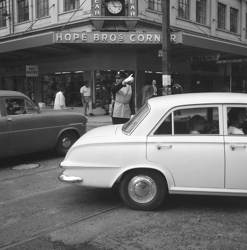 f. Traffic officer in luminous coat