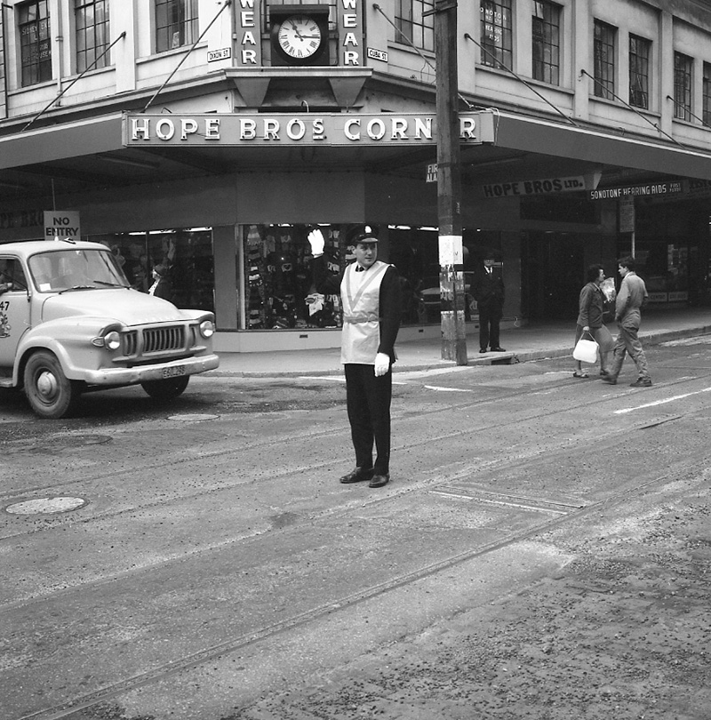 g. Traffic officer in luminous coat