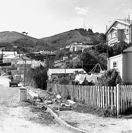 g. Roadworks, repairs to footpath, road and kerbing, corner of Orangi Kaupapa Road and Woburn Road