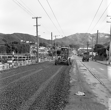 h. Views of workmen re surfacing the road. Machinery and motor vehicles