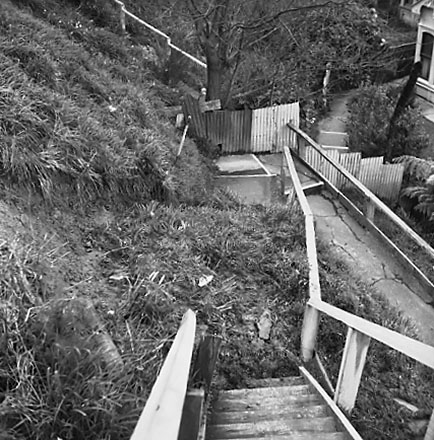c.Two storey wooden dwelling affected by slip