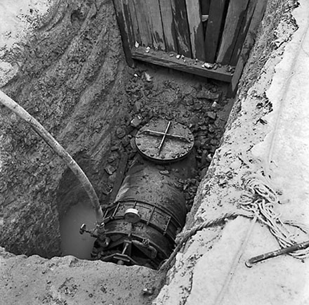 b. Exposed piece of waterworks pipe