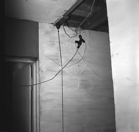 g. Interior and exterior views of a two storey wooden dwelling. Faulty plumbing and wiring